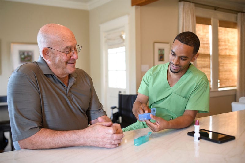 Nurse helping chronic disease patient