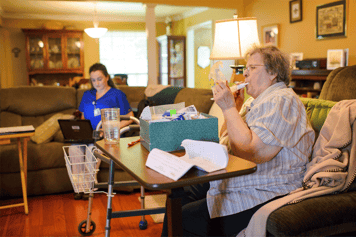 A speech therapist caring for a home health patient