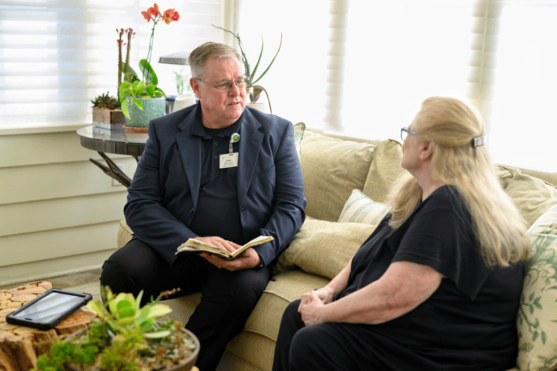 A chaplain with a hospice patient