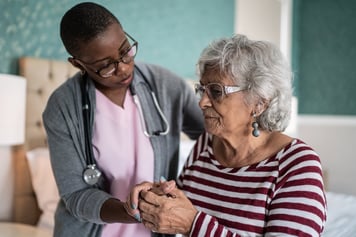 Doctor comforting patient