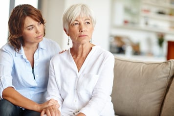 woman comforting older woman